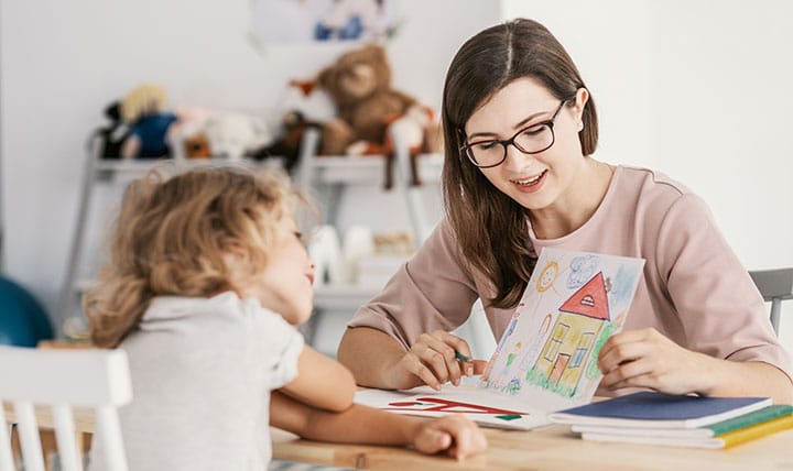 Therapist meets with child patient 